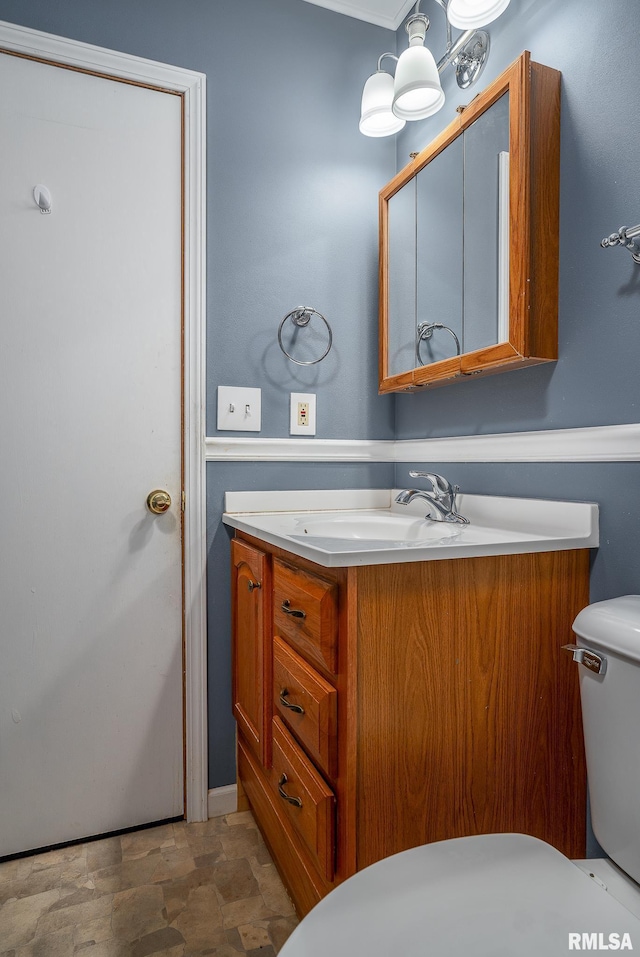 4718 19th Ave, Moline, IL 61265 - half bathroom with vanity and stone finish floors