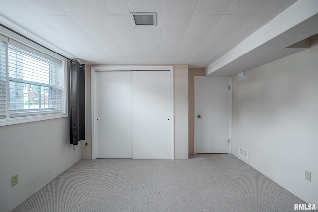 4718 19th Ave, Moline, IL 61265 - unfurnished bedroom featuring carpet and a closet