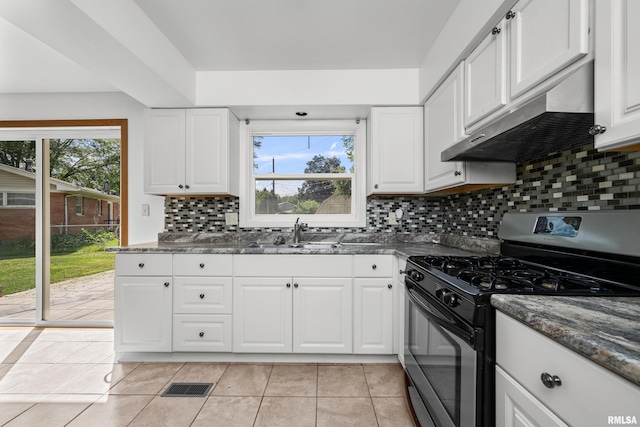 2525 4th St Unit A, East Moline, IL 61244 - kitchen featuring stainless steel gas stove, under cabinet range hood, white cabinetry, and light tile patterned floors