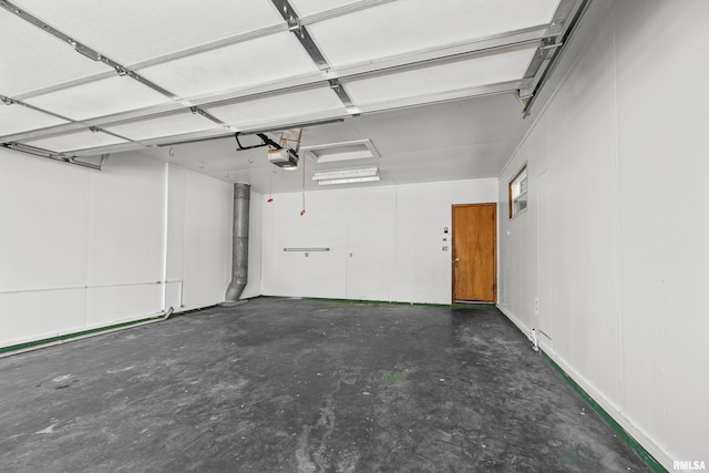 2525 4th St Unit A, East Moline, IL 61244 - garage featuring a garage door opener