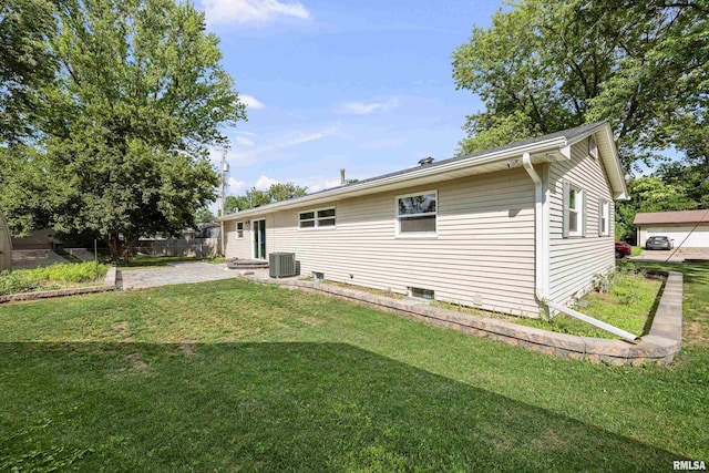 2525 4th St Unit A, East Moline, IL 61244 - back of house featuring a patio