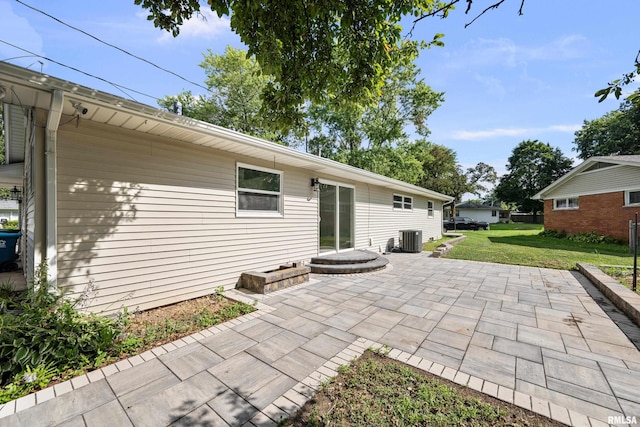 2525 4th St Unit A, East Moline, IL 61244 - rear view of property featuring a lawn and a patio area