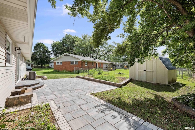 2525 4th St Unit A, East Moline, IL 61244 - view of patio featuring a shed