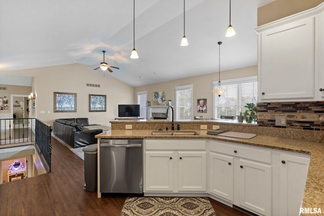 3484 Field Sike Dr, Bettendorf, IA 52722 - kitchen with stainless steel dishwasher, a ceiling fan, lofted ceiling, dark wood-type flooring, and backsplash