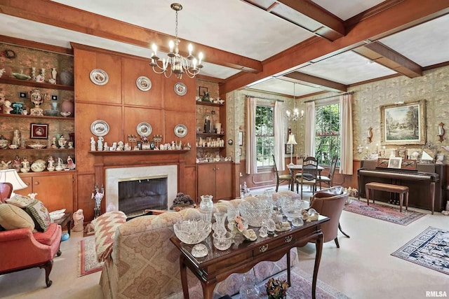 1928 Fernwood Ave, Davenport, IA 52803 - living area featuring a chandelier, beamed ceiling, a fireplace, finished concrete floors, and built in features