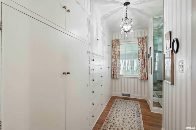 1928 Fernwood Ave, Davenport, IA 52803 - entryway with wood finished floors and a chandelier