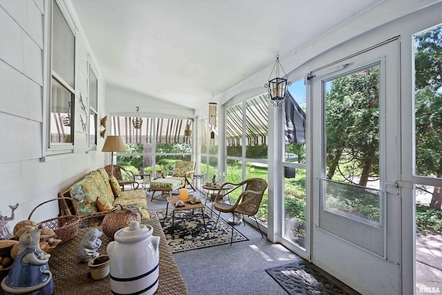 1928 Fernwood Ave, Davenport, IA 52803 - sunroom featuring an outdoor hangout area, plenty of natural light, and carpet flooring