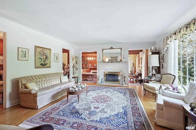 1928 Fernwood Ave, Davenport, IA 52803 - living area with ornamental molding, wood finished floors, and a high end fireplace