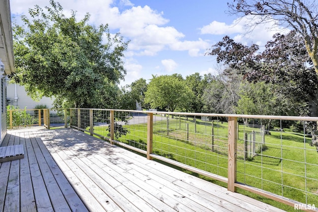 304 E Plum St, Anamosa, IA 52205 - wooden deck featuring a yard