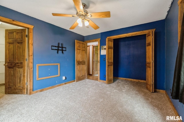 335 Sand Aly, Toronto, IA 52777 - unfurnished bedroom featuring carpet flooring, a closet, and ceiling fan