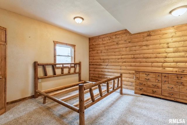 335 Sand Aly, Toronto, IA 52777 - bedroom with rustic walls and light carpet