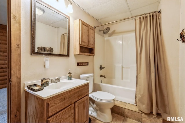 335 Sand Aly, Toronto, IA 52777 - bathroom featuring vanity, a drop ceiling, shower / bathtub combination with curtain, and tile patterned flooring