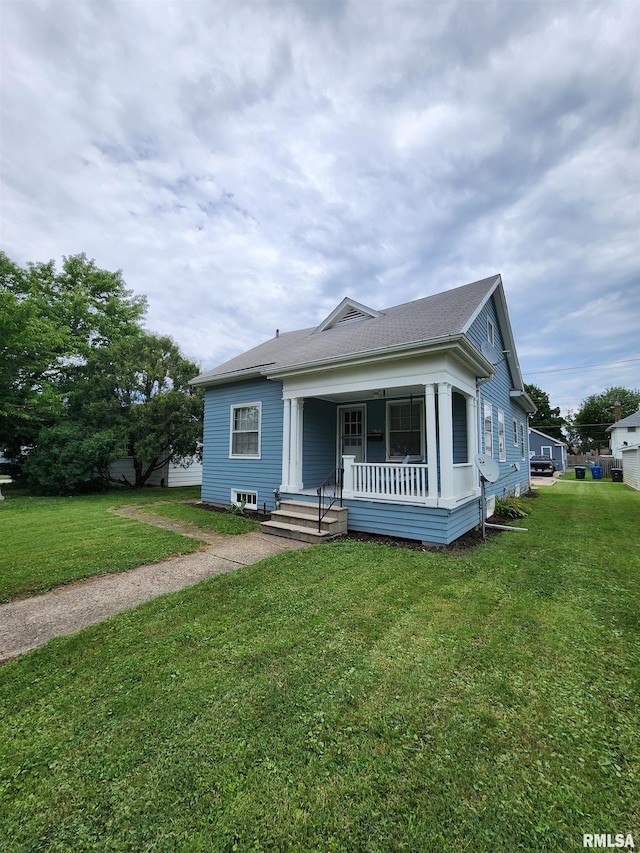 1908 24th St, Moline, IL 61265 - bungalow-style home featuring covered porch and a front yard
