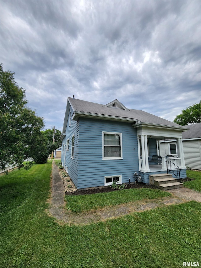 1908 24th St, Moline, IL 61265 - view of front of house with a front lawn and a porch