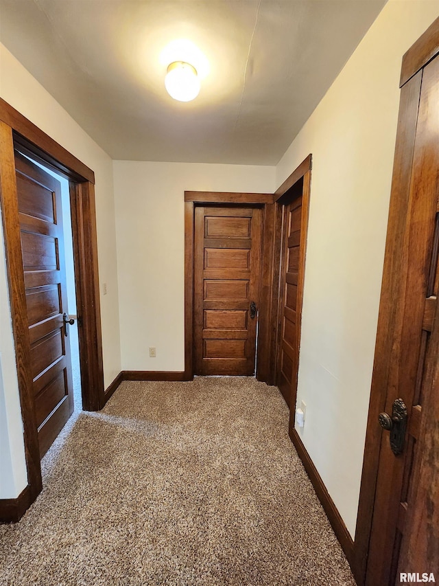 1908 24th St, Moline, IL 61265 - hallway featuring baseboards and carpet