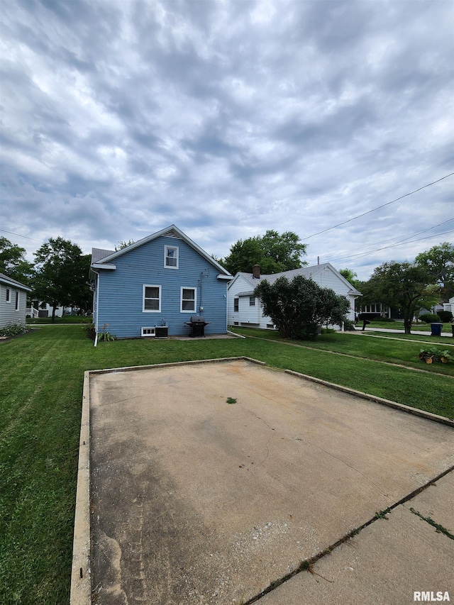 1908 24th St, Moline, IL 61265 - view of home's exterior featuring a lawn