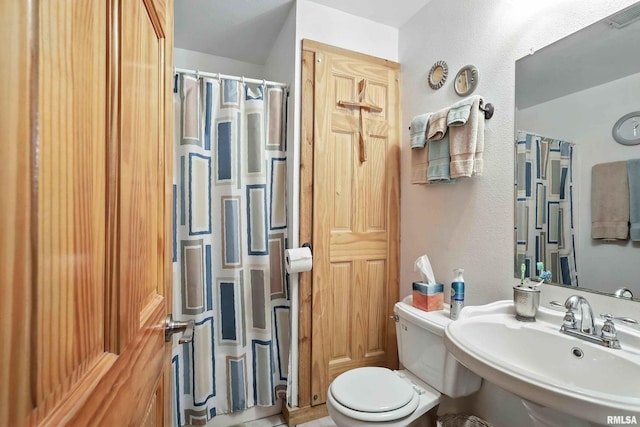 18599 317th St, Long Grove, IA 52756 - full bath featuring a textured wall and curtained shower