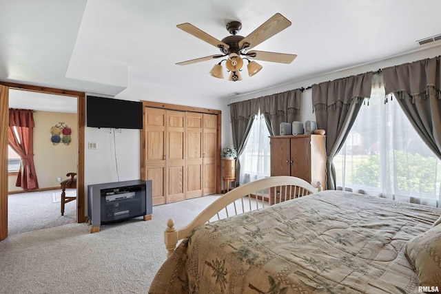 18599 317th St, Long Grove, IA 52756 - bedroom featuring carpet, a closet, and a ceiling fan