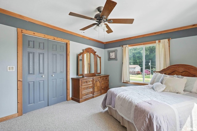 18599 317th St, Long Grove, IA 52756 - carpeted bedroom featuring a closet and ceiling fan