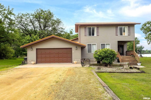 18599 317th St, Long Grove, IA 52756 - traditional home with a front yard, dirt driveway, and a garage