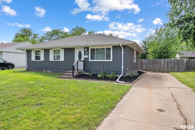2506 Holly Dr, Bettendorf, IA 52722 - view of front of house with driveway and board and batten siding
