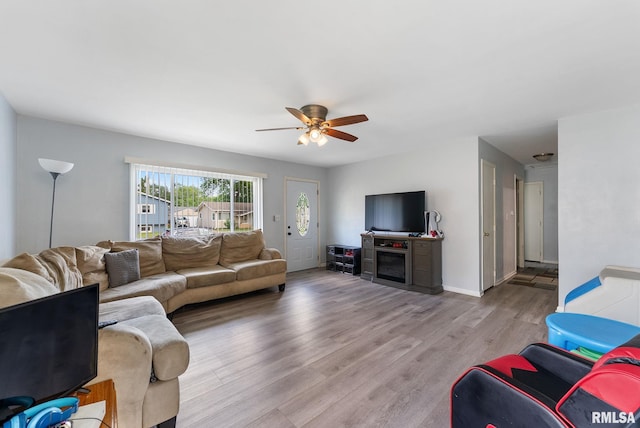 2506 Holly Dr, Bettendorf, IA 52722 - living room featuring ceiling fan and light wood-style floors