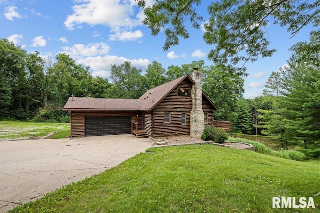 7319 106th Ave, Coal Valley, IL 61240 - log home featuring concrete driveway, an attached garage, a front lawn, and a chimney