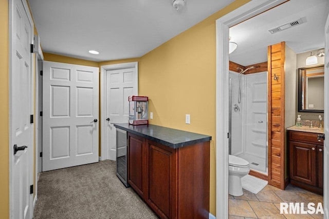 7319 106th Ave, Coal Valley, IL 61240 - full bathroom with a stall shower, vanity, and recessed lighting