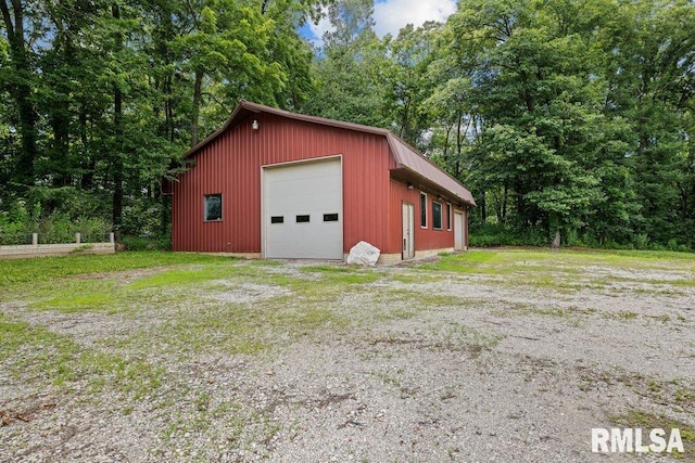 7319 106th Ave, Coal Valley, IL 61240 - detached garage with view of wooded area