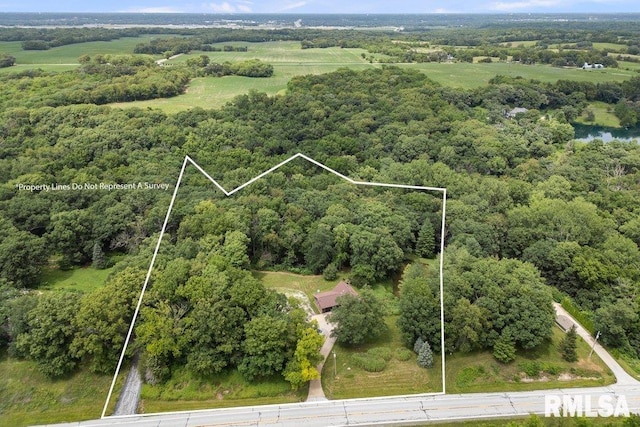 7319 106th Ave, Coal Valley, IL 61240 - aerial view of property and surrounding area with property boundaries highlighted and a forest