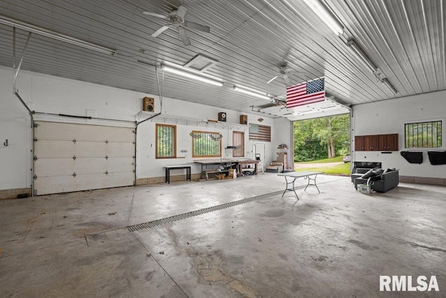 7319 106th Ave, Coal Valley, IL 61240 - garage featuring a ceiling fan