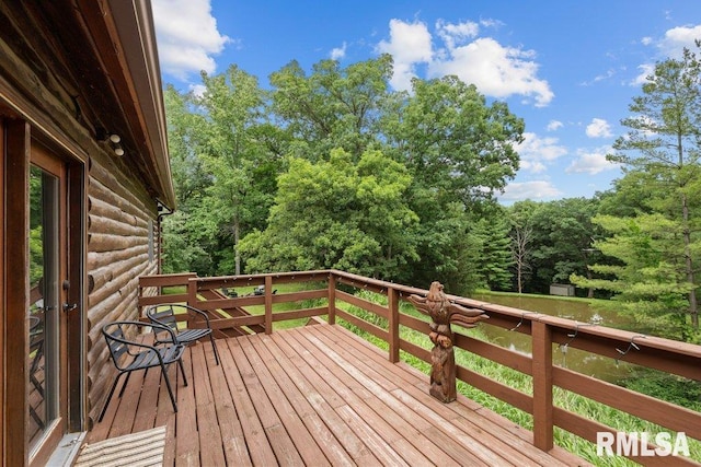 7319 106th Ave, Coal Valley, IL 61240 - deck with a wooded view