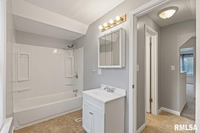 3916 W Locust St, Davenport, IA 52804 - bathroom with vanity and washtub / shower combination