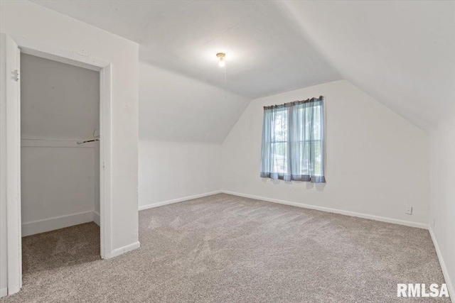3916 W Locust St, Davenport, IA 52804 - additional living space featuring carpet and lofted ceiling