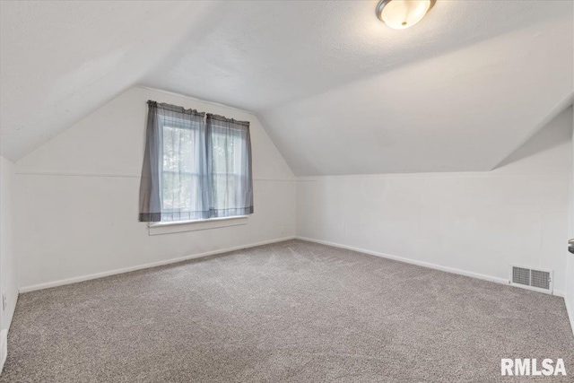3916 W Locust St, Davenport, IA 52804 - bonus room with lofted ceiling and carpet flooring