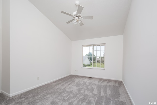 1263 33rd Avenue Cir, Silvis, IL 61282 - spare room featuring carpet, lofted ceiling, and a ceiling fan