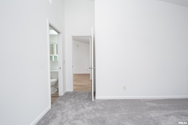 1263 33rd Avenue Cir, Silvis, IL 61282 - carpeted empty room featuring baseboards