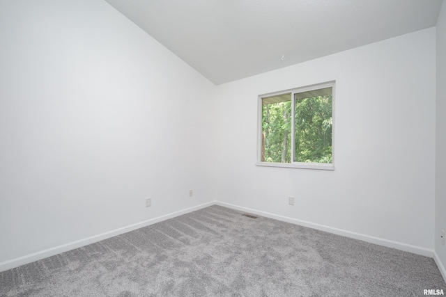 1263 33rd Avenue Cir, Silvis, IL 61282 - carpeted empty room featuring baseboards and lofted ceiling