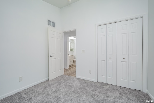 1263 33rd Avenue Cir, Silvis, IL 61282 - unfurnished bedroom featuring light colored carpet and a closet