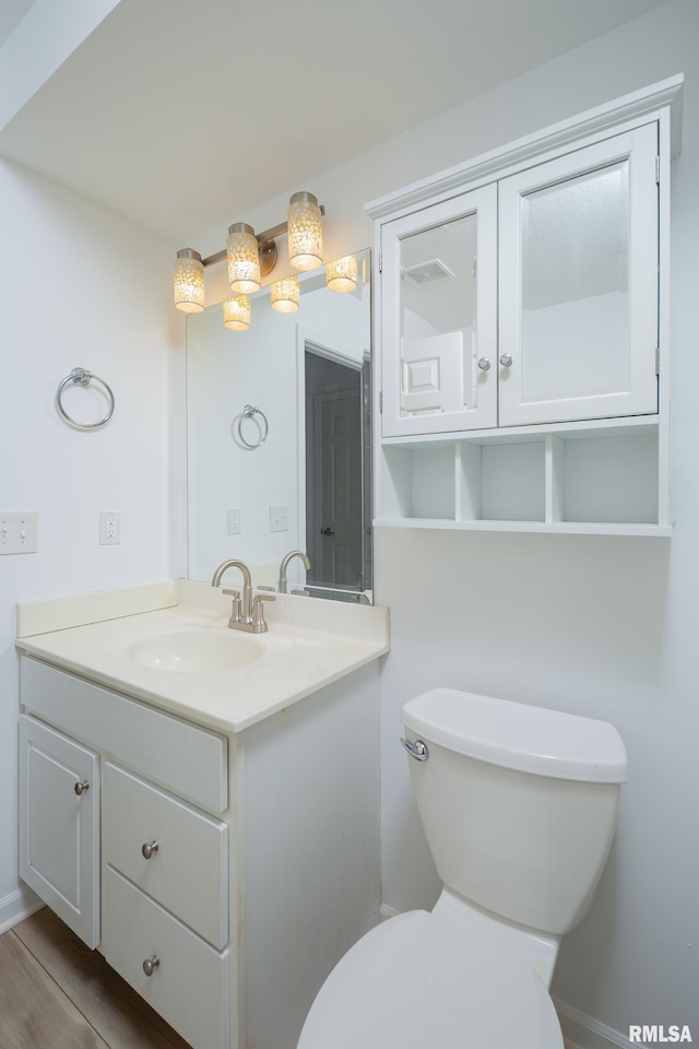 1263 33rd Avenue Cir, Silvis, IL 61282 - half bathroom featuring vanity and toilet