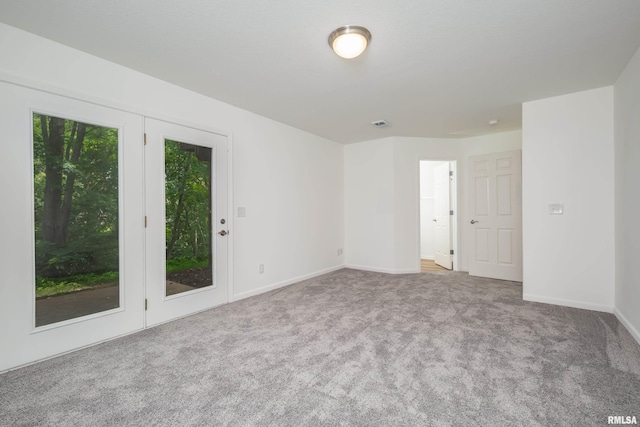 1263 33rd Avenue Cir, Silvis, IL 61282 - empty room with carpet floors and baseboards