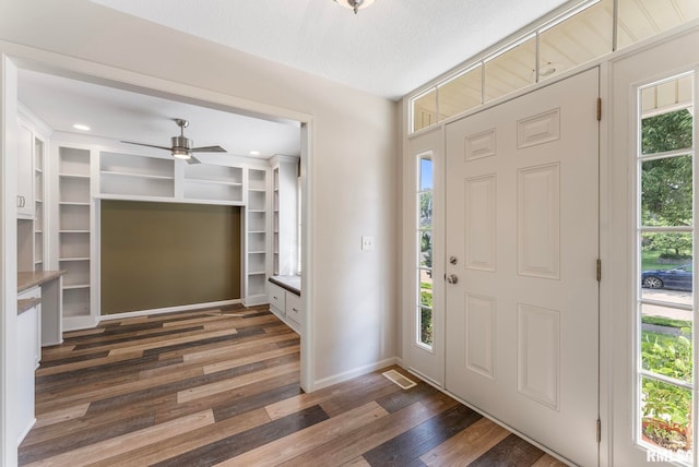 5320 Appleton Dr, Davenport, IA 52804 - entryway with dark wood-type flooring and ceiling fan