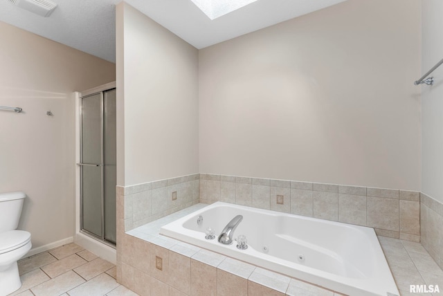 5320 Appleton Dr, Davenport, IA 52804 - full bath with a whirlpool tub, a skylight, a shower stall, and tile patterned floors