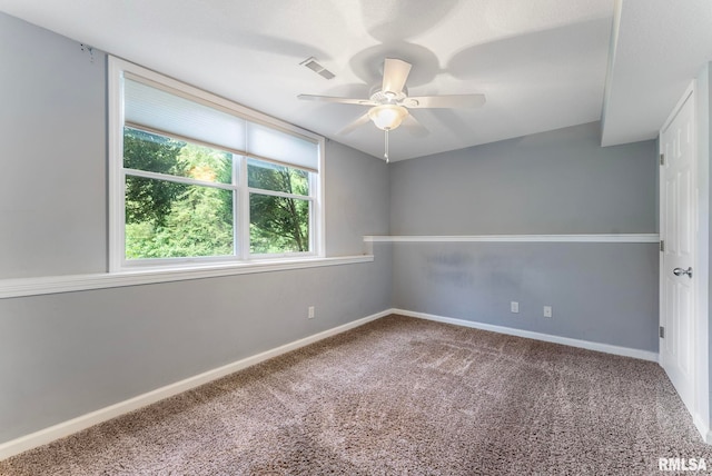 5320 Appleton Dr, Davenport, IA 52804 - carpeted empty room featuring a ceiling fan and baseboards