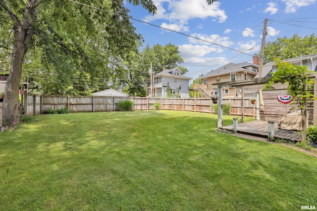 2510 Pershing Ave, Davenport, IA 52803 - fenced backyard with a deck