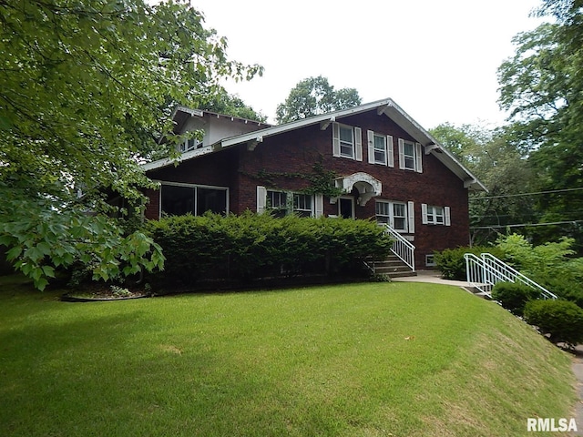 1132 24th Ave, Moline, IL 61265 - view of front of property with brick siding and a front lawn