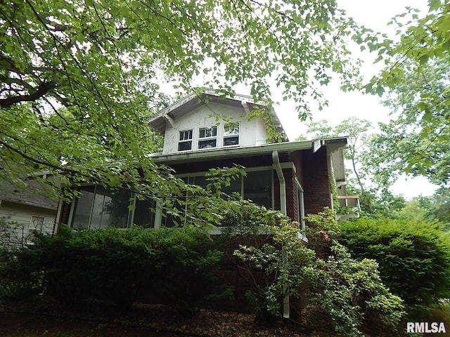 1132 24th Ave, Moline, IL 61265 - view of front facade with a sunroom