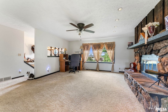 25622 1st Ave N, Hillsdale, IL 61257 - office space featuring carpet, ceiling fan, a textured ceiling, a fireplace, and recessed lighting