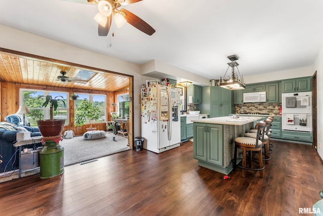 25622 1st Ave N, Hillsdale, IL 61257 - kitchen featuring green cabinets, white appliances, light countertops, ceiling fan, and wooden ceiling