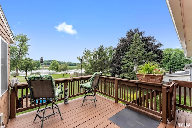 25622 1st Ave N, Hillsdale, IL 61257 - wooden terrace with a water view and a lawn